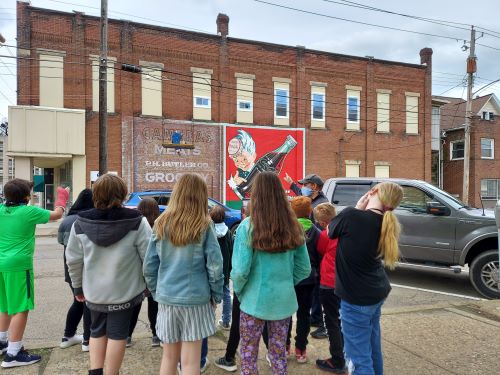 Local Students Tour Murals In Butler