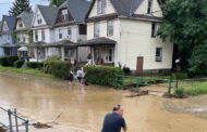 Residents Cleaning Up After Flooding