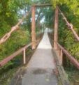 Woman Injured After Jumping Off Swinging Bridge