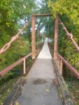 Woman Injured After Jumping Off Swinging Bridge